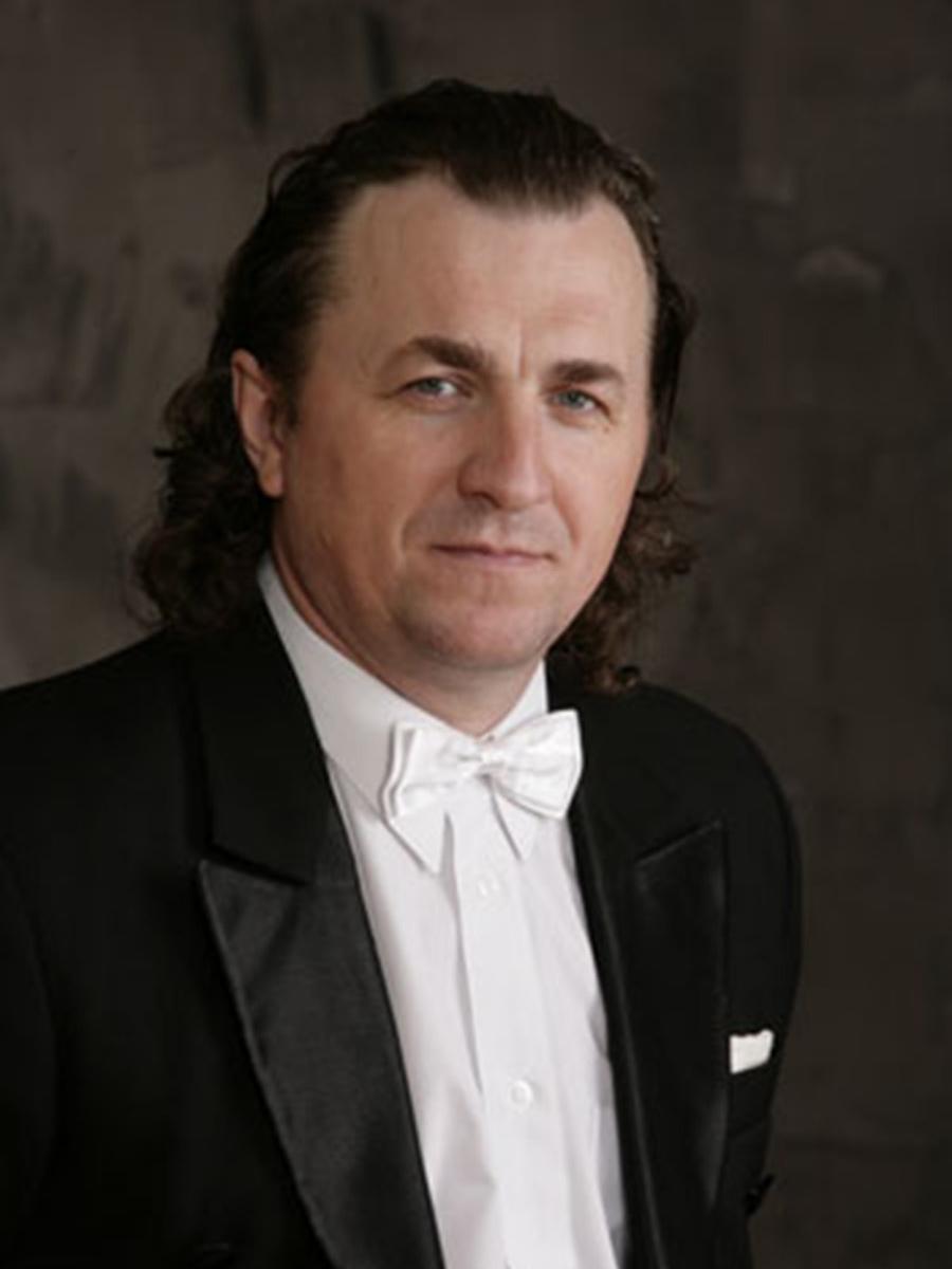 A man is shown in a portrait photo.