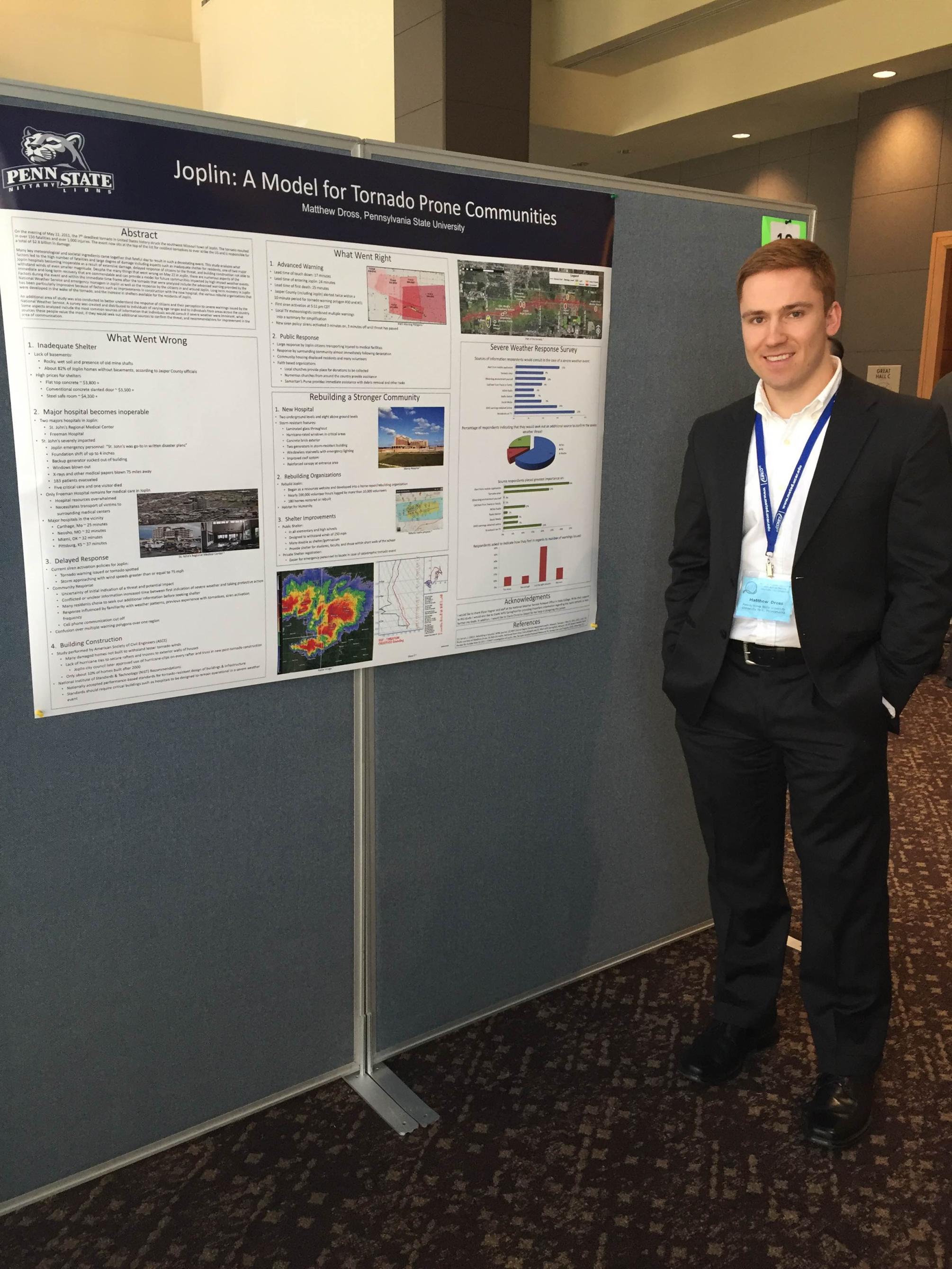 student presents poster at conference