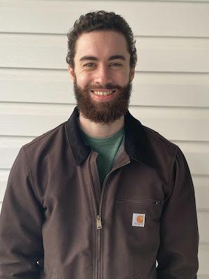 A smiling student poses. 