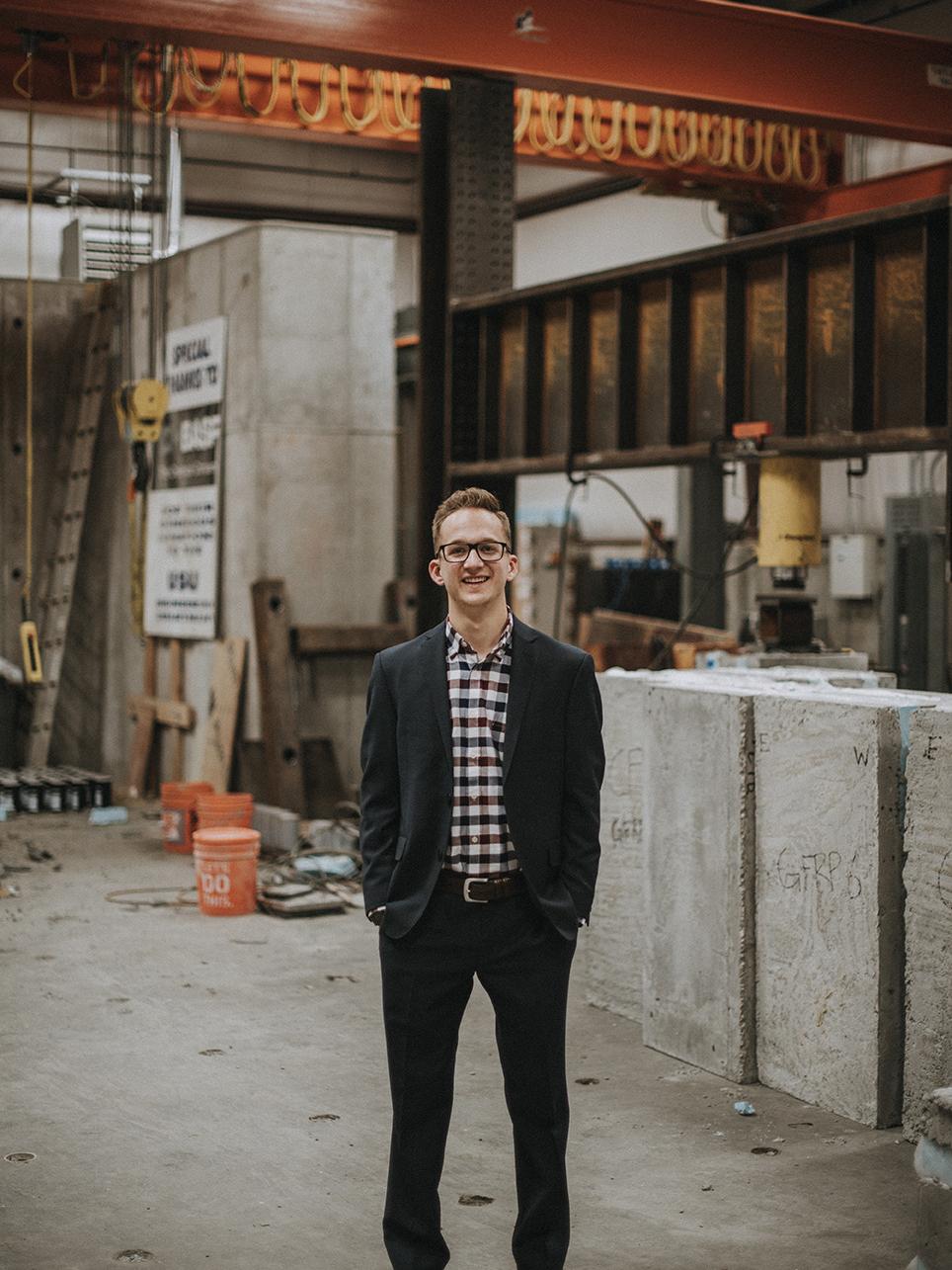 man stands in concrete laboratory