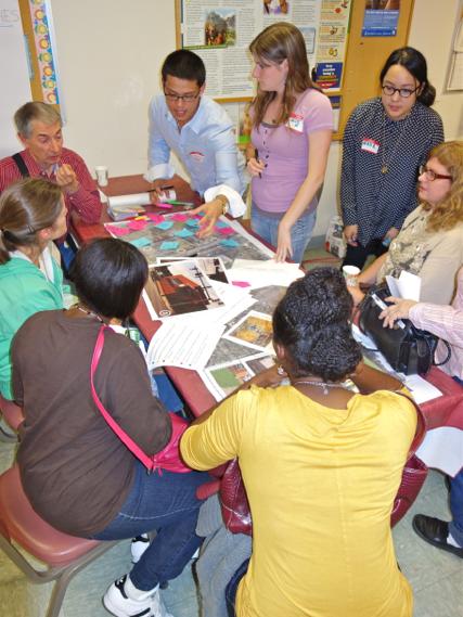 Aaron Ramos talks to Hazelwood community members during a meeting