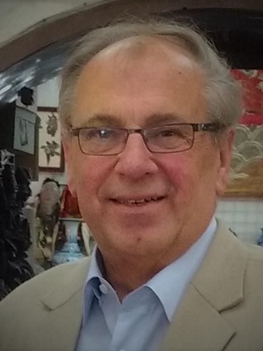 close up photo of man in blazer