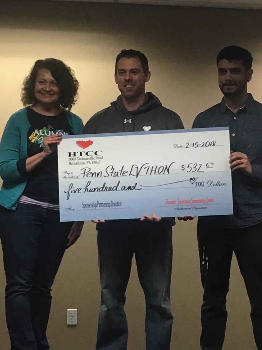 man presenting check