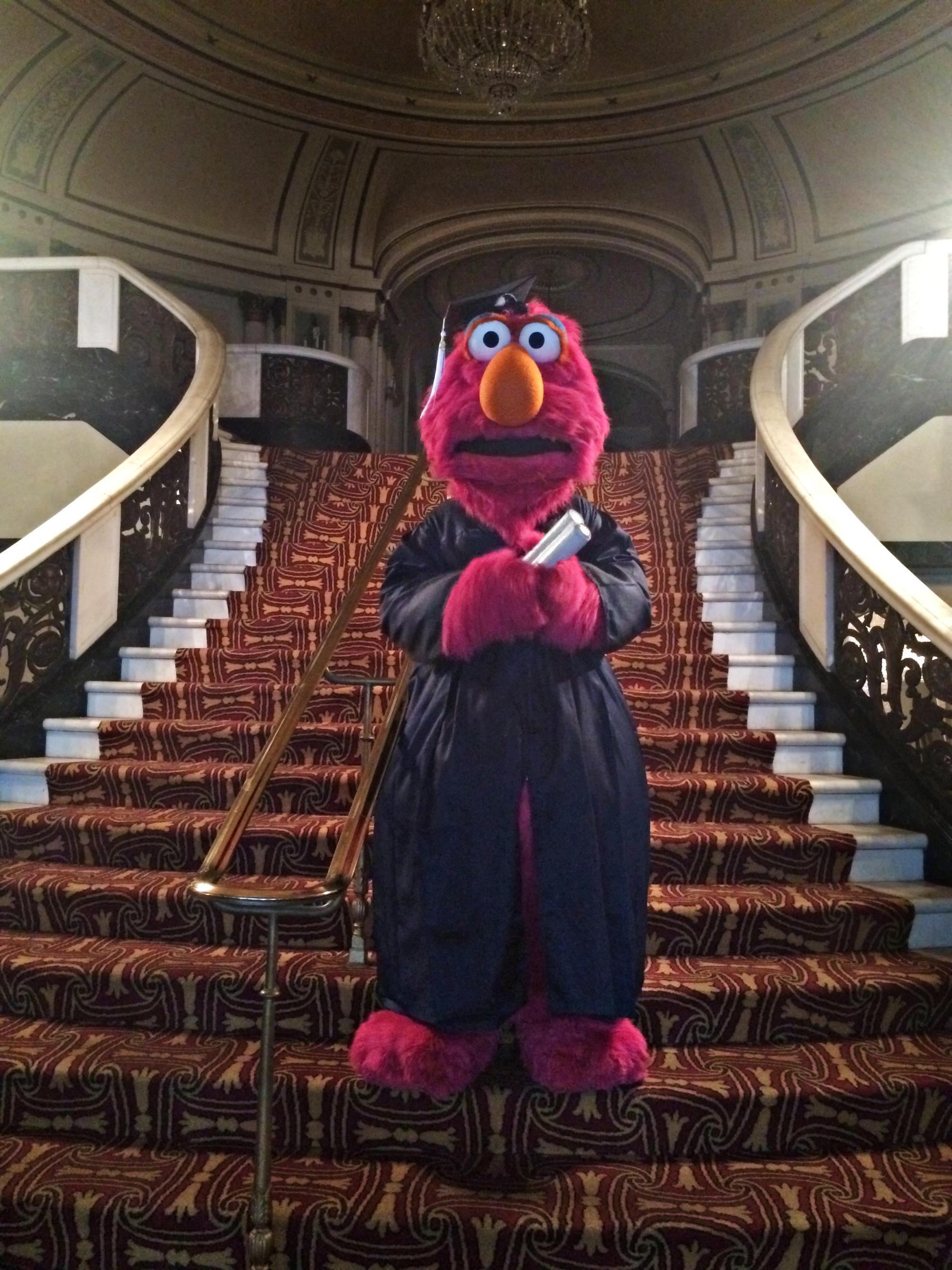 Telly Monster in cap and gown