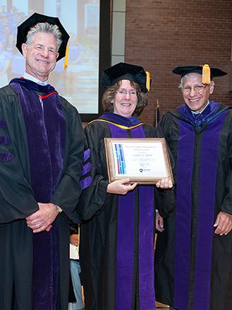 Interim Dean Gary Gildin, Professor of Laurel S. Terry, and H. Laddie Montague Jr.