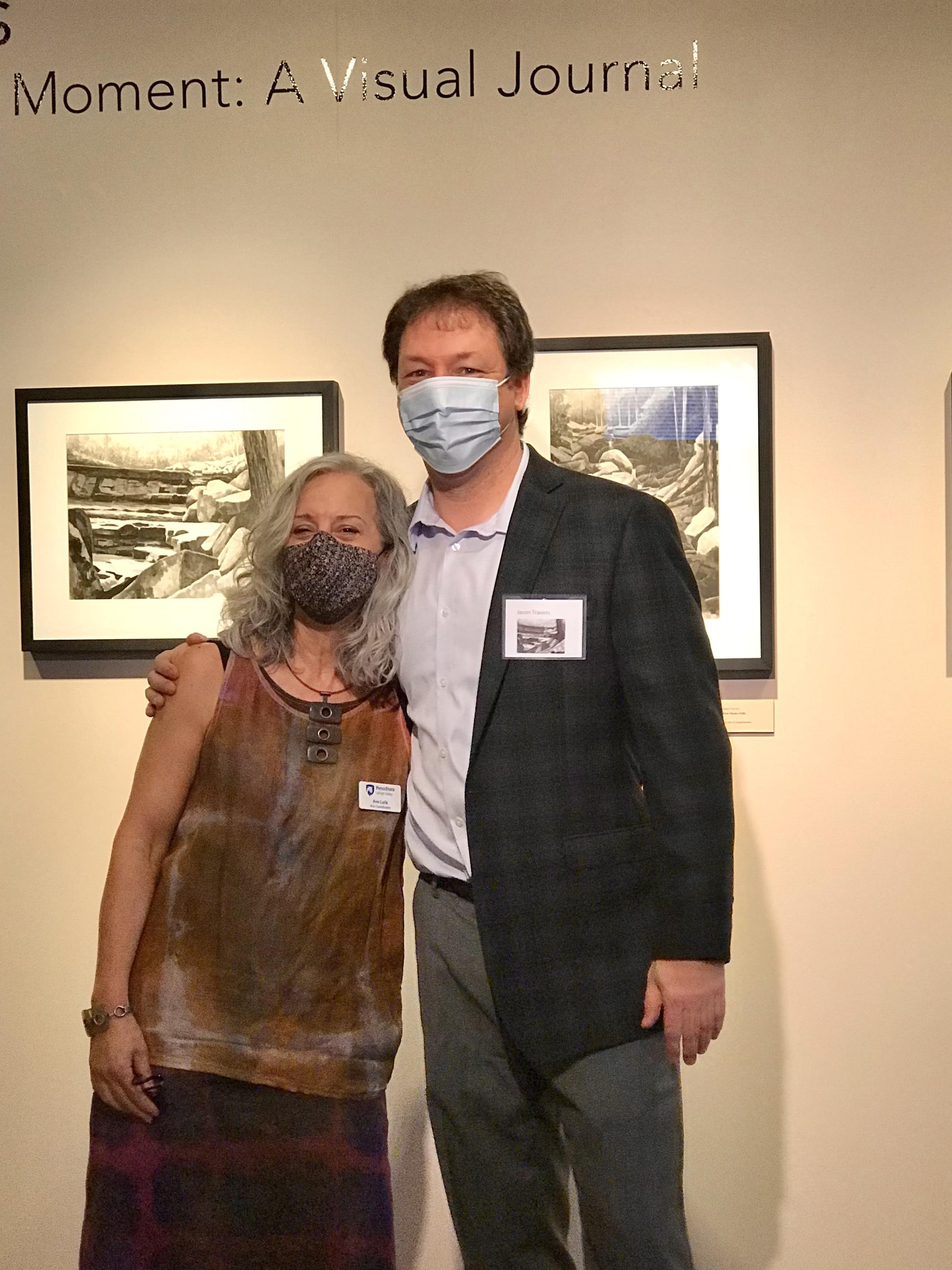 Penn State Lehigh Valley Gallery Director Ann Lalik stands with artist Jason Travers