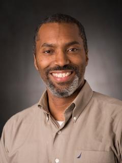 Headshot of an African American man.