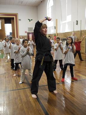 Valerie Cholet holds a martial arts class at Glenside Elementary School