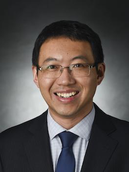 male professor poses for professional headshot