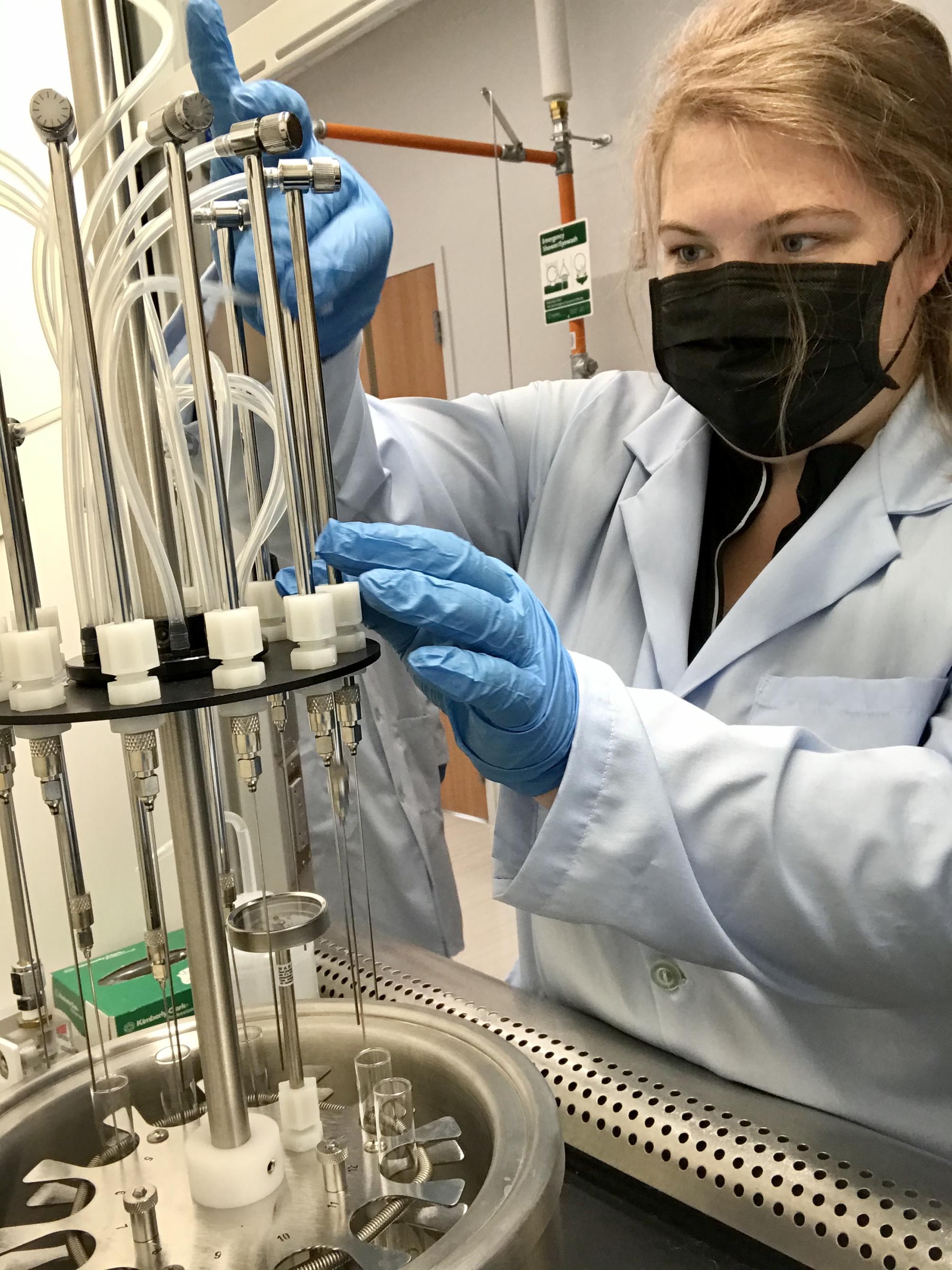 Woman filtering wastewater