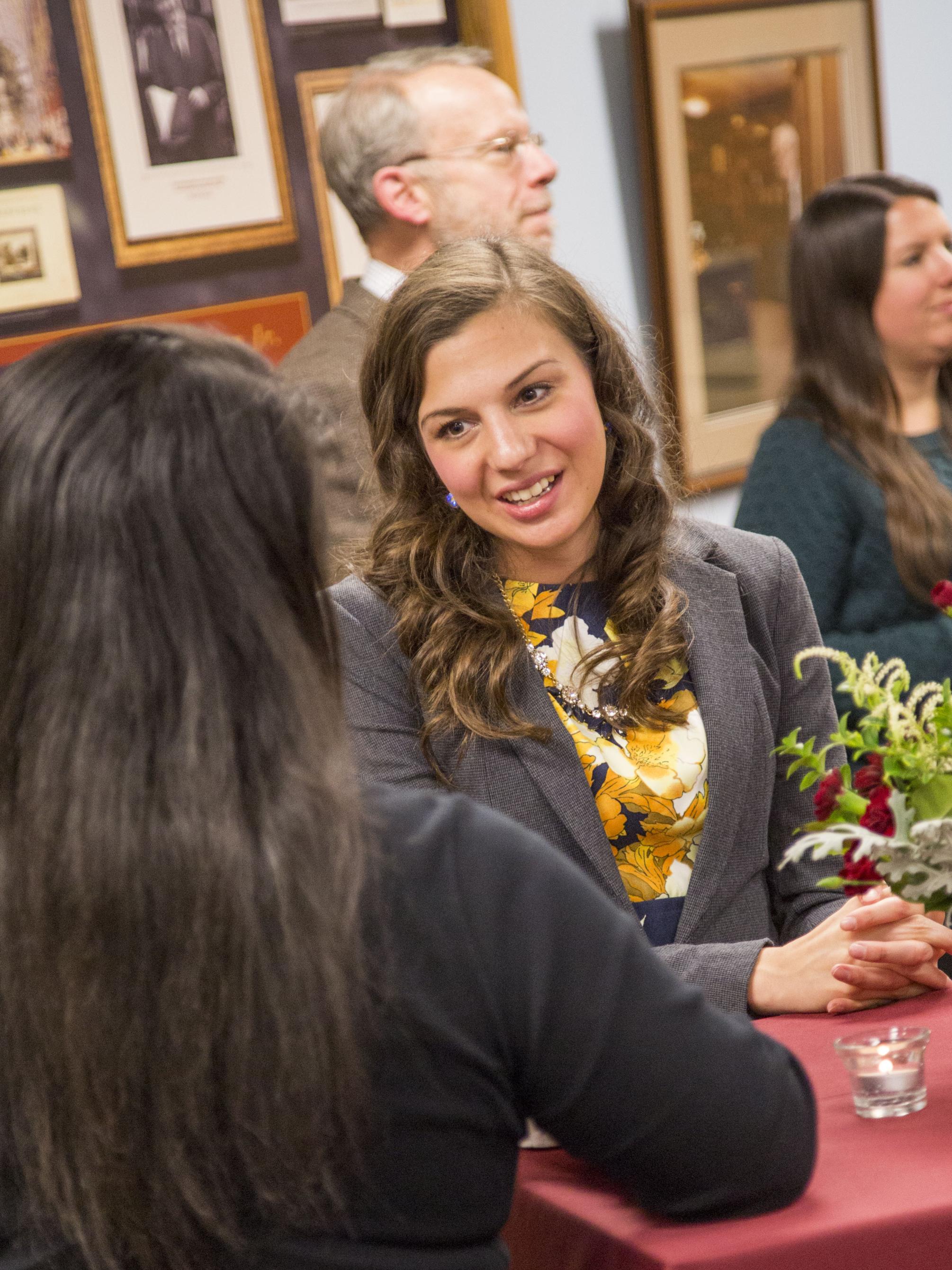 Mary Beth Spang interacts with students at the networking reception