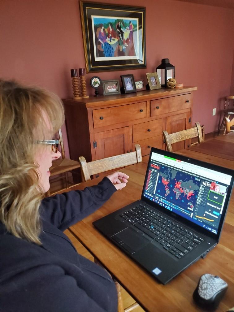 faculty member at her desk