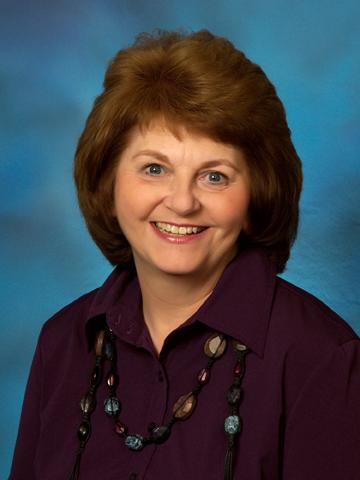 head shot of Carol