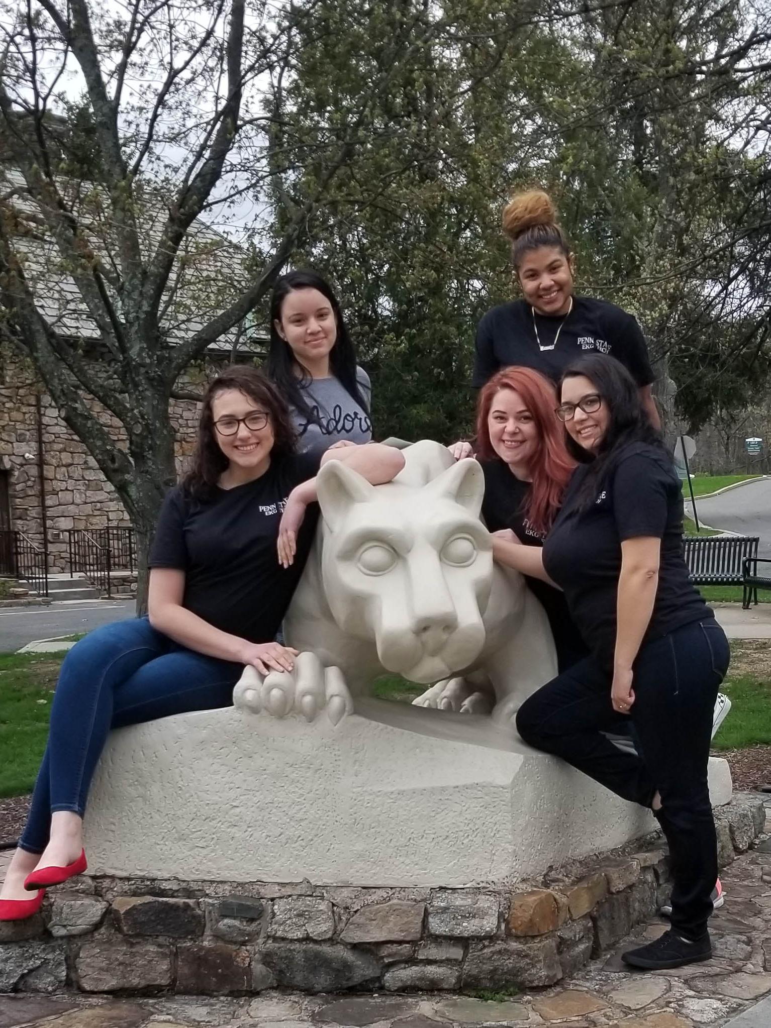 Among the EKG graduates are, from left: Tatiana Kania, Adriana Bencosme, Kristina van Harshkemp and Biana Knight, and Ysmely Henriquez at back right. Absent from photo: Angela Winn and Julia Bowman.