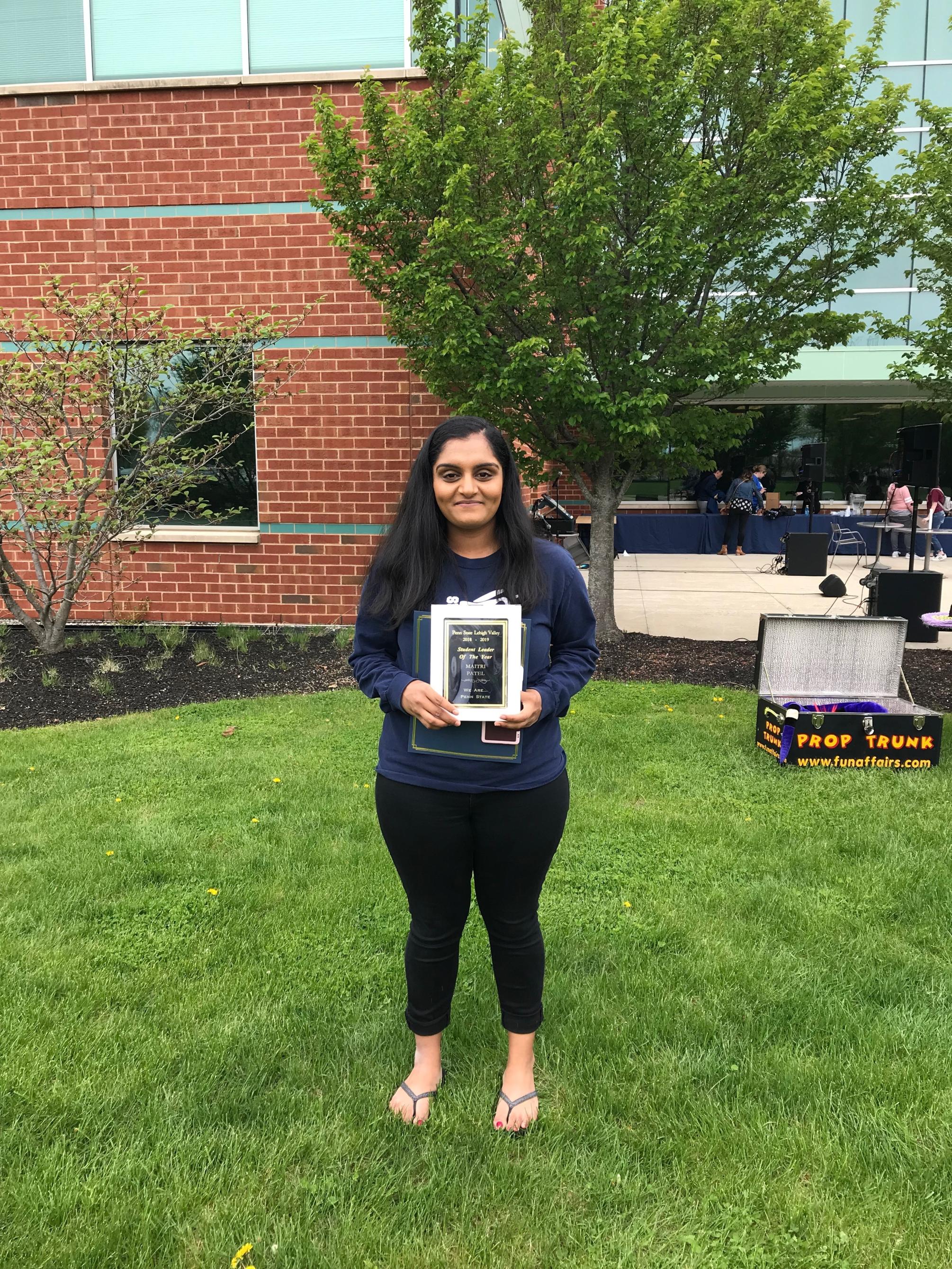 female student with award