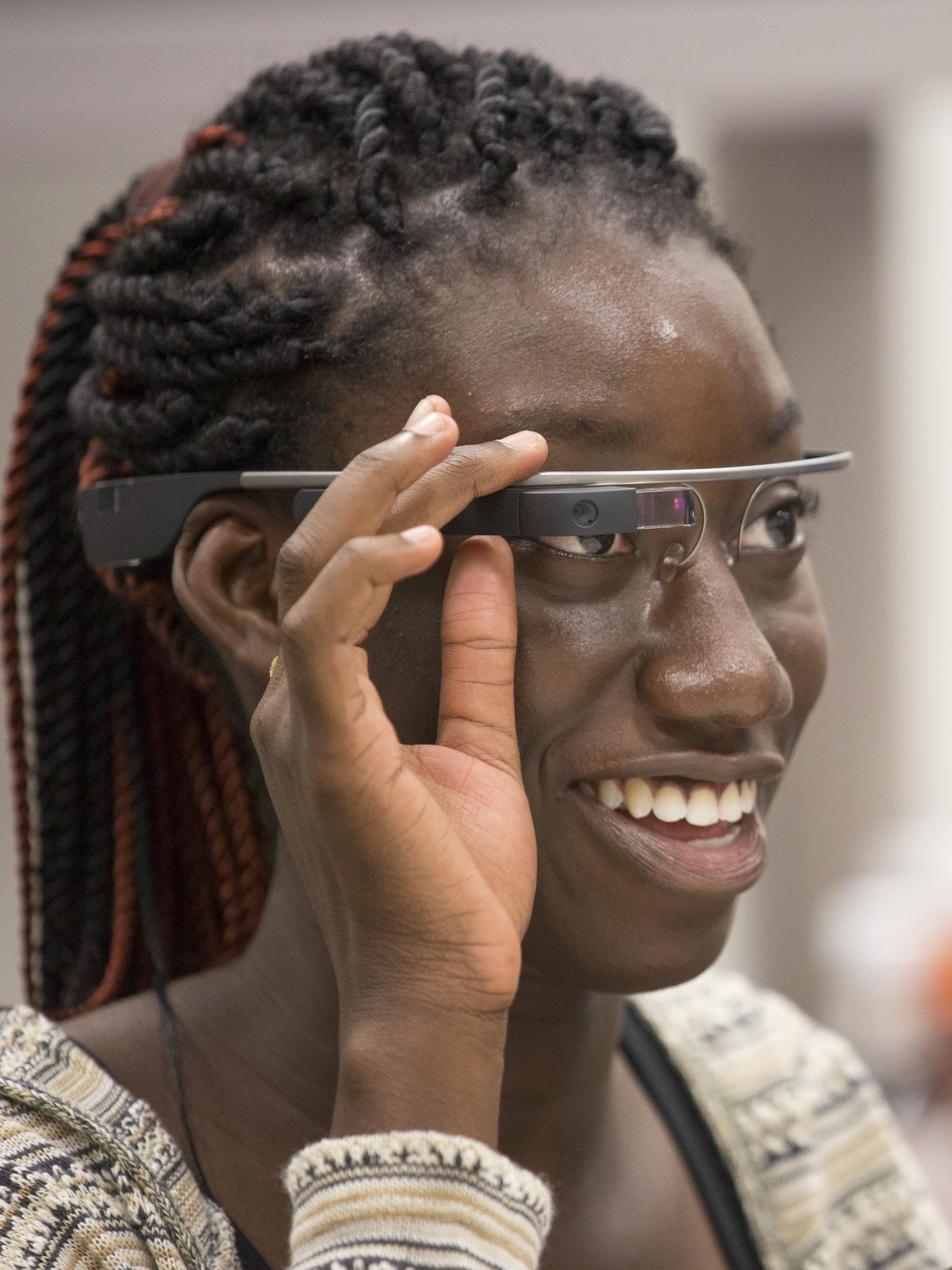 Emma Dodoo tries on a pair of Google Glasses.