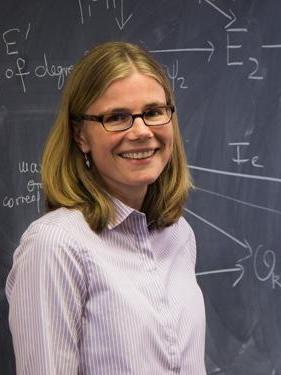 Eisentraeger in front of chalkboard