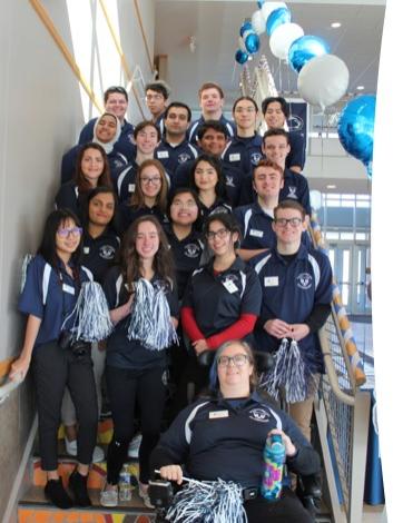 group of students lined up on stairs