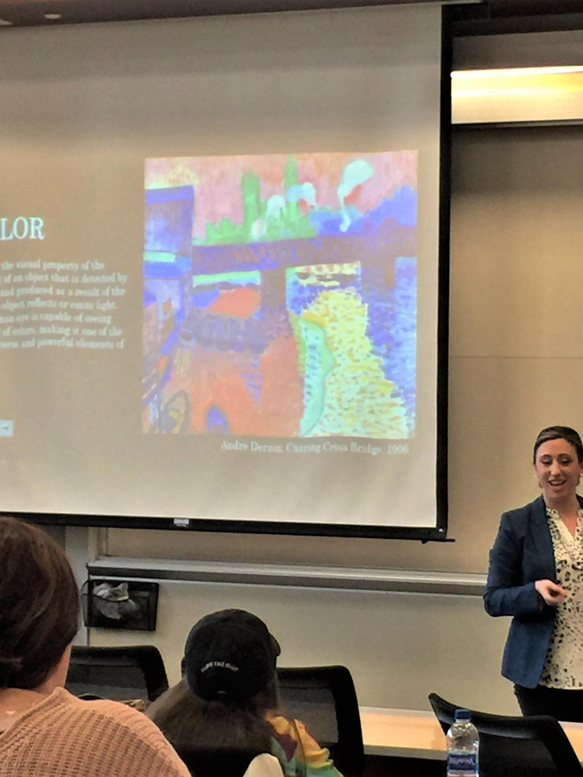 Thompson shows slides showing  how colors are used in art