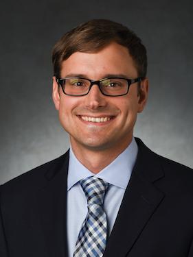  A head and shoulders shot of a man.