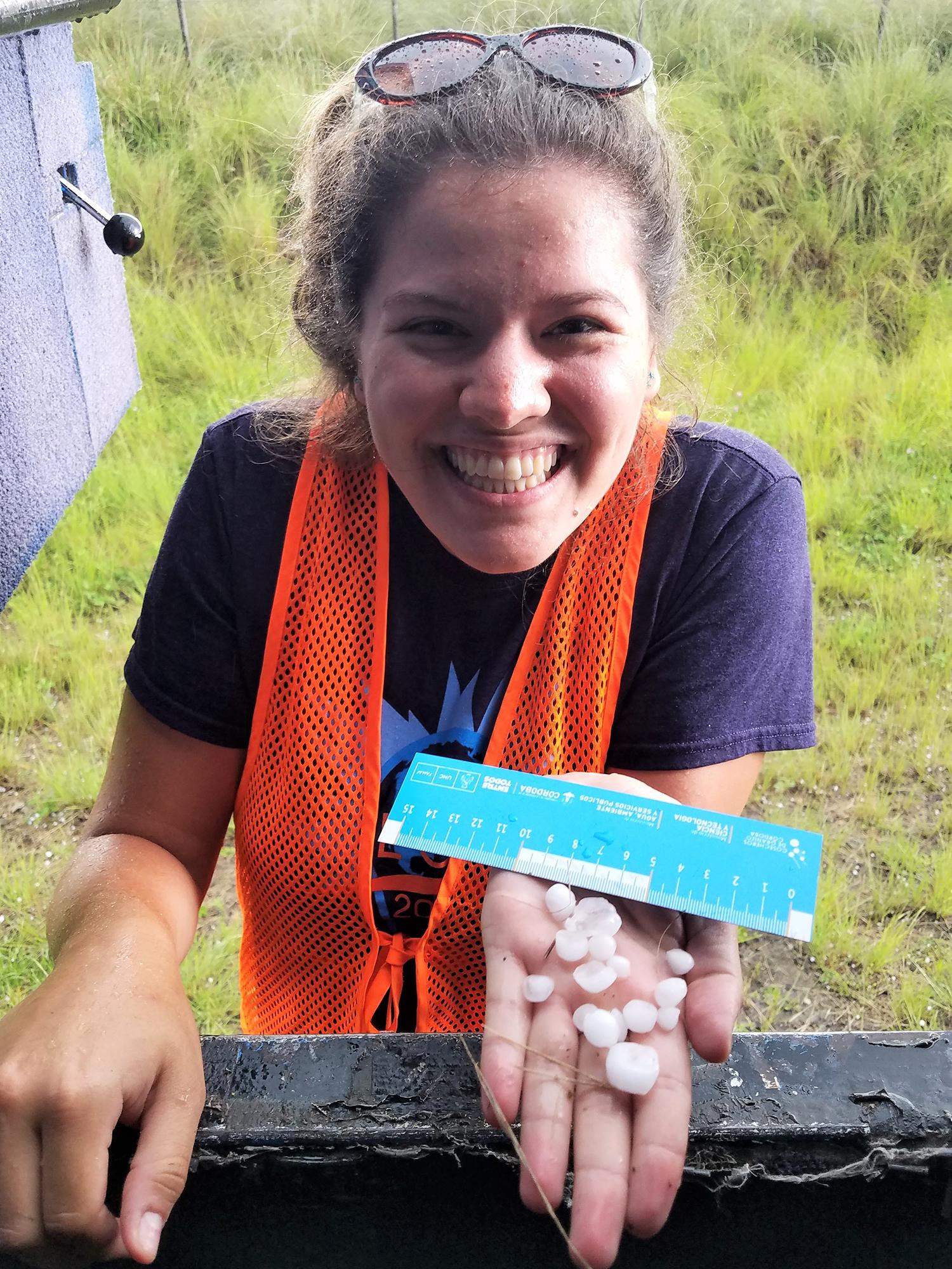 Rachel Gutierrez measures hailstones as part of her research on the formation of the precipitation. 