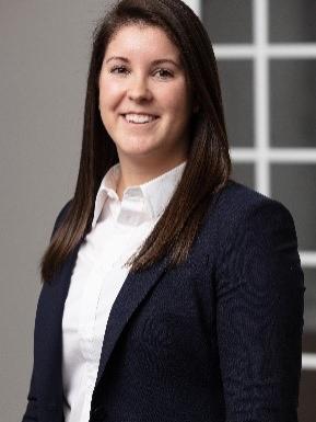 head shot of woman in suit