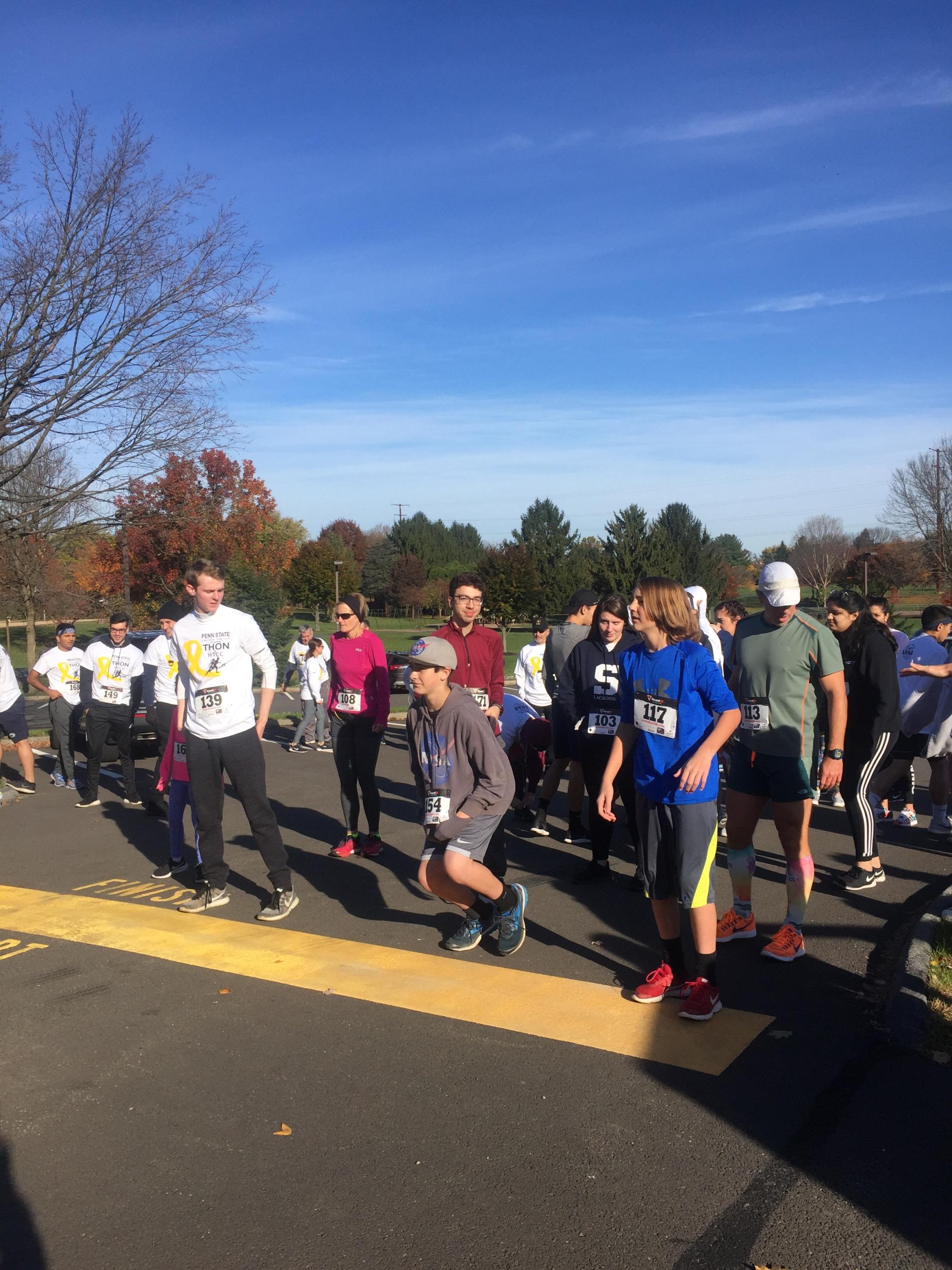 runners line up at starting line