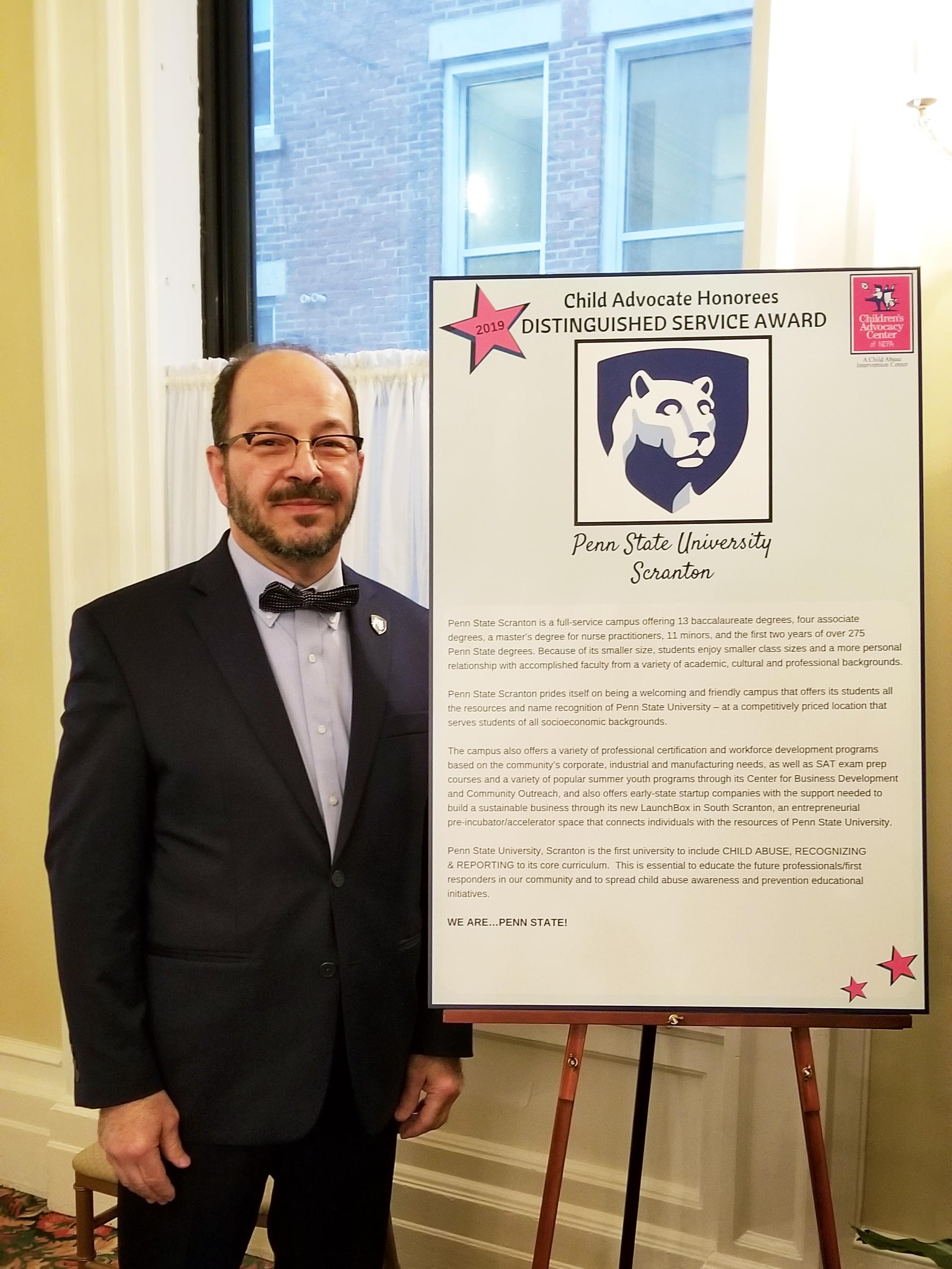 Marwan Wafa with child advocacy award
