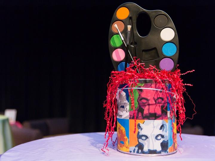 Paint can centerpiece on table at the 2018 Off the Wall pARTy