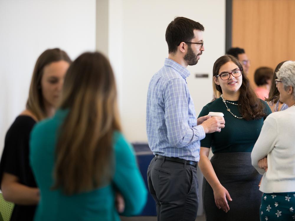 Young professionals networking at Penn State at the Navy Yard