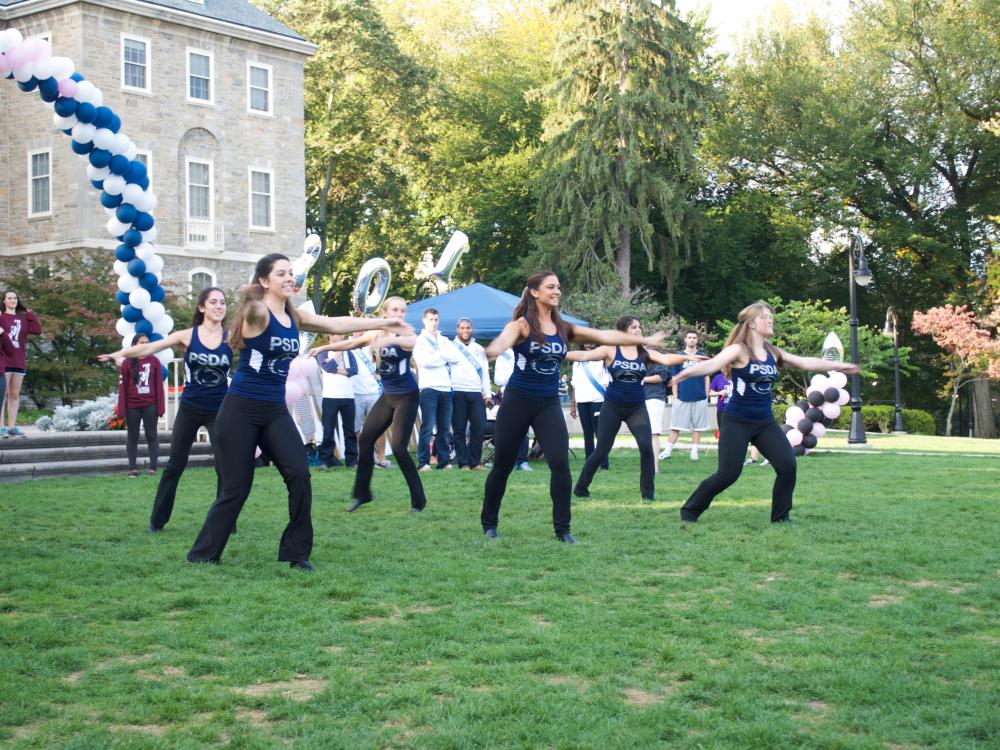 Students performing outside of Old Main