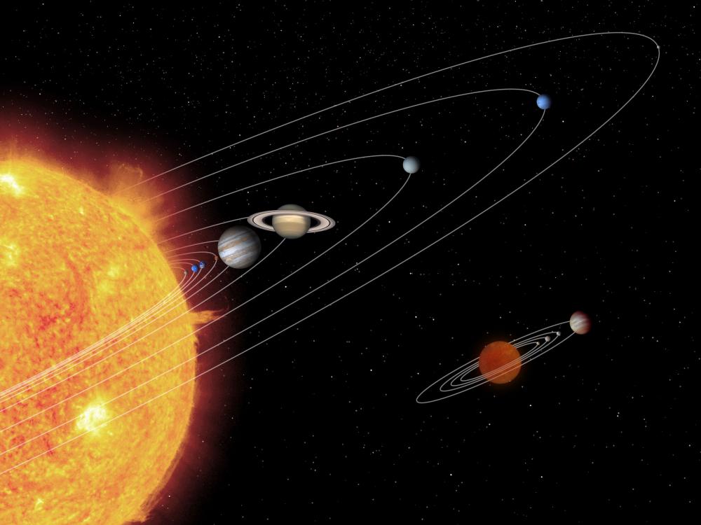 illustration of brown dwarf system is tiny next to solar system