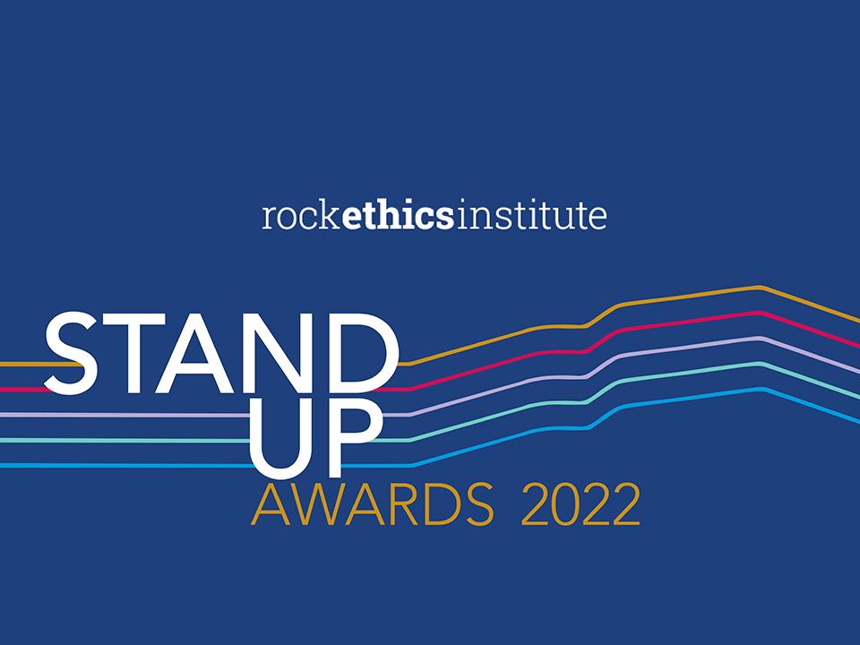 "Rock Ethics Institute Stand Up Awards 2022" on a blue background, different-colored lines form the silhouette of Mt. Nittany