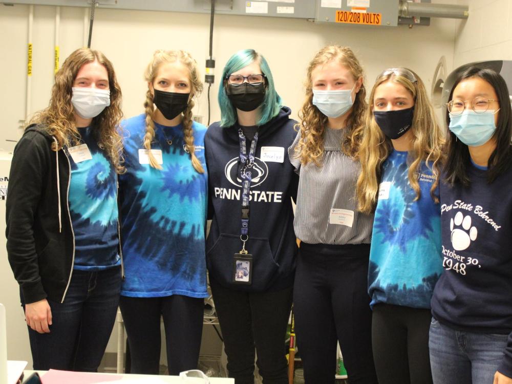 Six female student volunteers pose for a group photo during Penn State Behrend's Women in Engineering Day program.