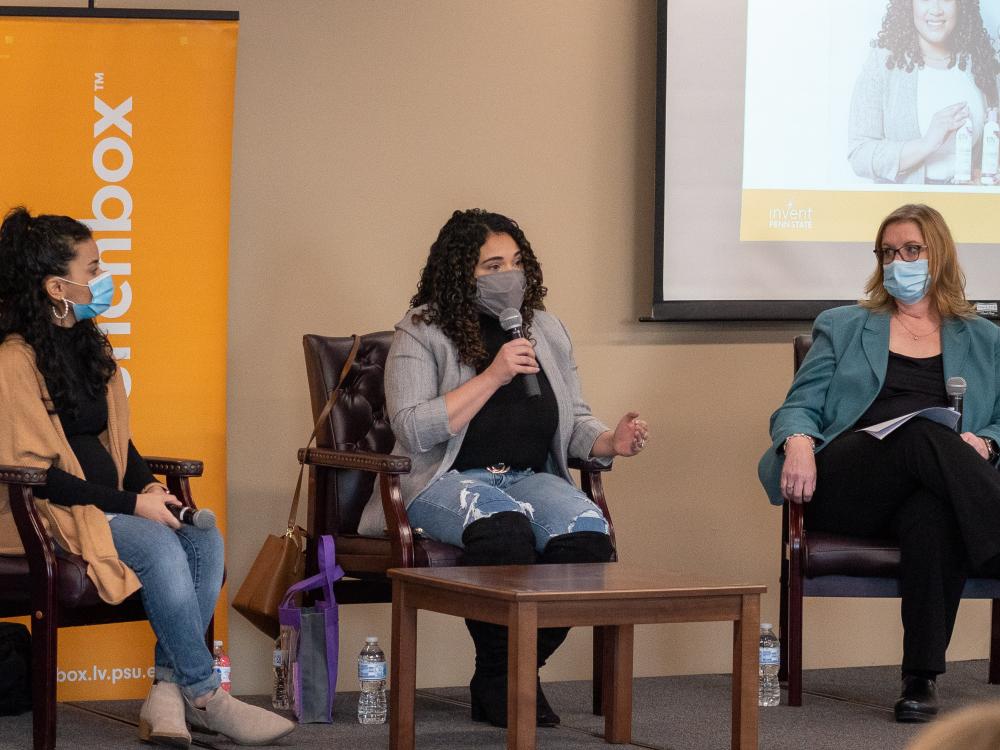 LaunchBox Ladies Series participants speak to crowd at event. 