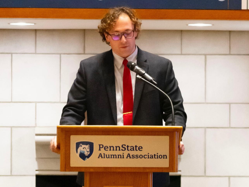 William McCarter stands at podium