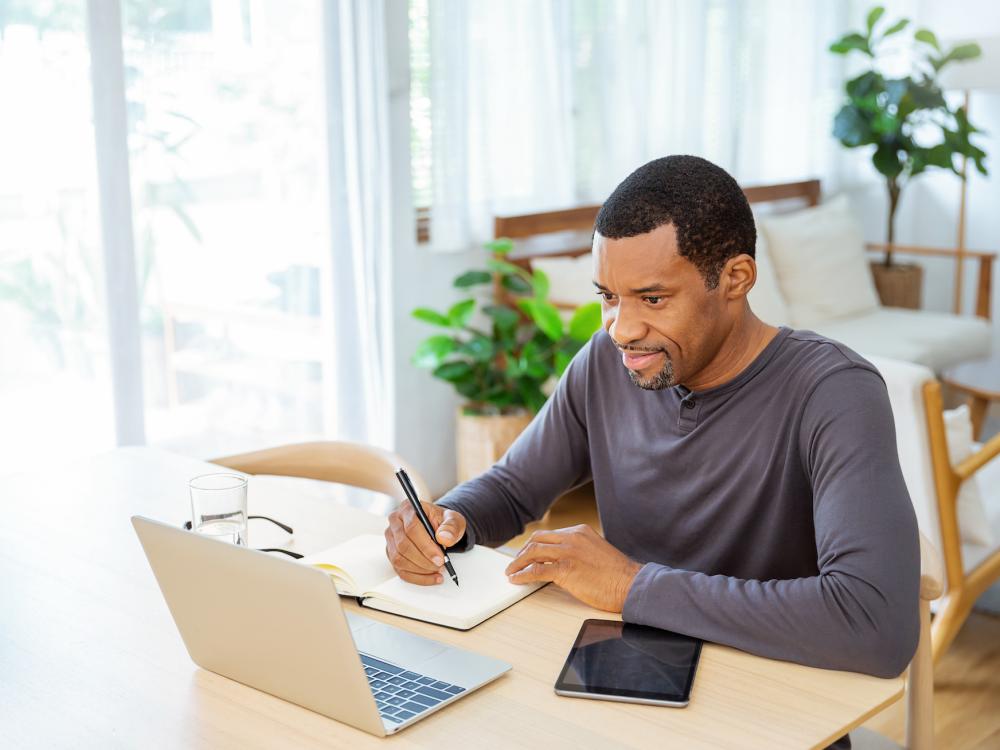 Man sitting in front of computer