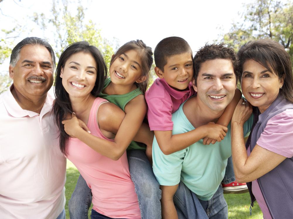 Several people of Hispanic/Latino decent who appear to be 3 generations of a family