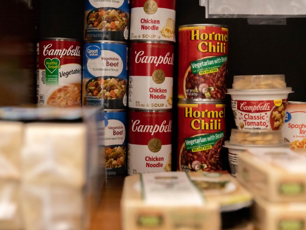Canned goods and other products in cabinet