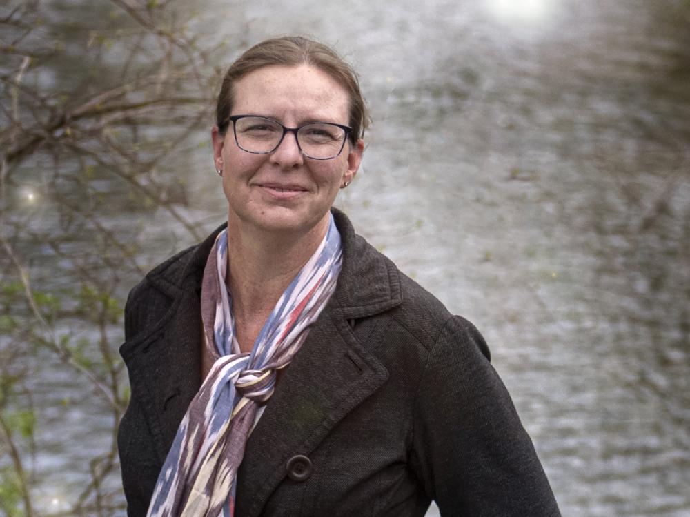 Lara Fowler in front of water