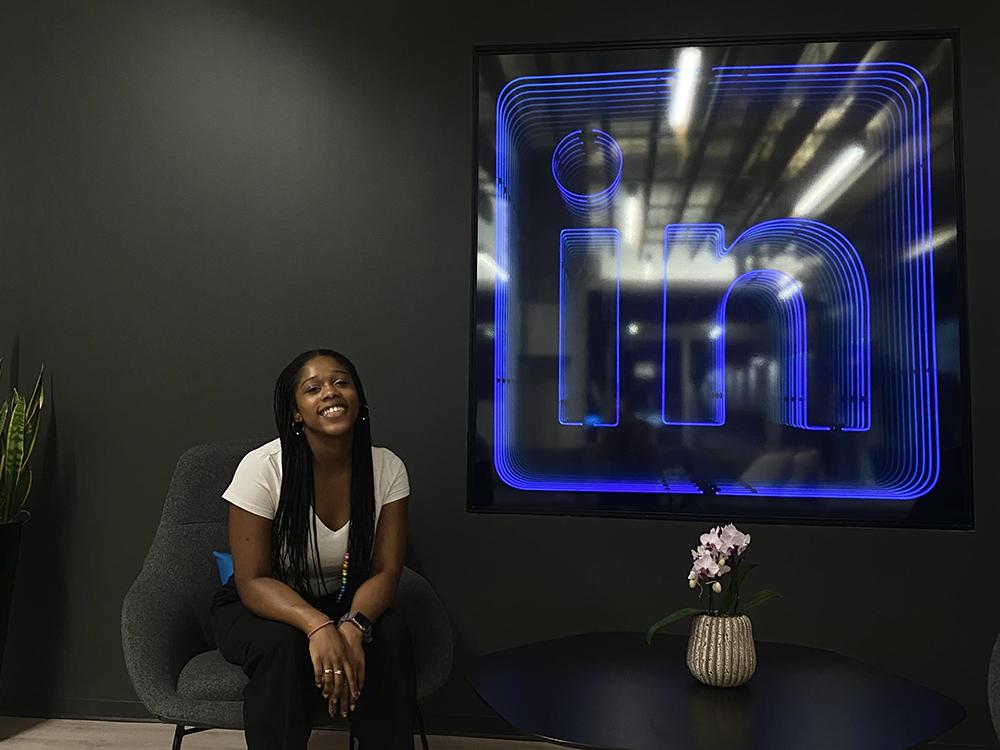 Kay Adetiba sits in the lounge area of the LinkedIn office in New York. 