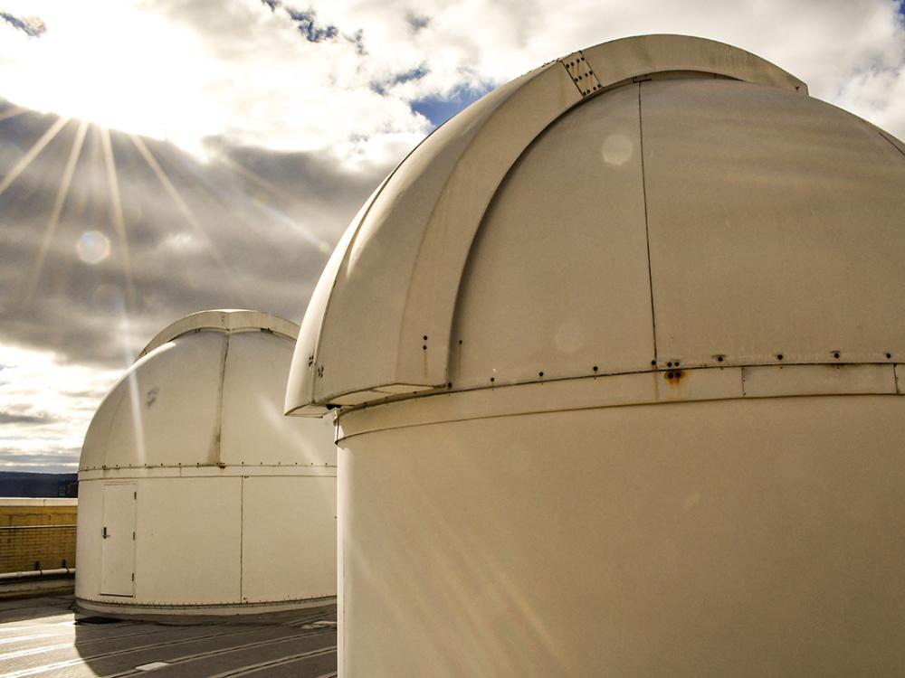 Protective domes cover the telescopes at Davey Lab’s rooftop observatory, Penn State University Park.