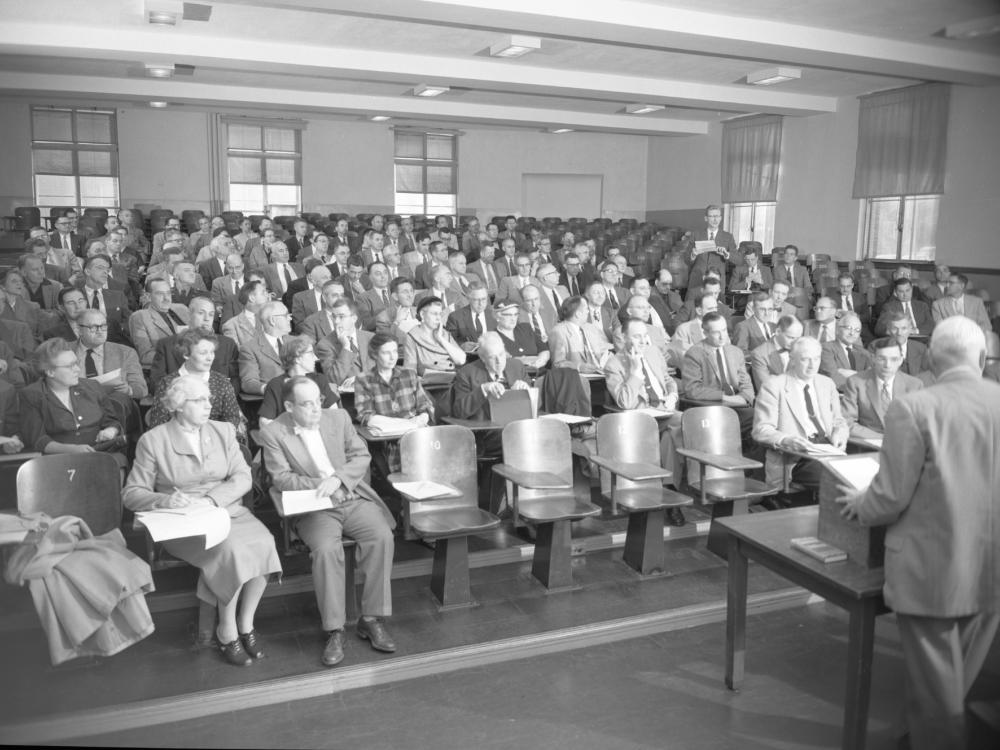 In this 1956 file photo from the Penn State University Libraries archives, the Faculty Senate conducts its business in an unlisted building on the University Park campus.