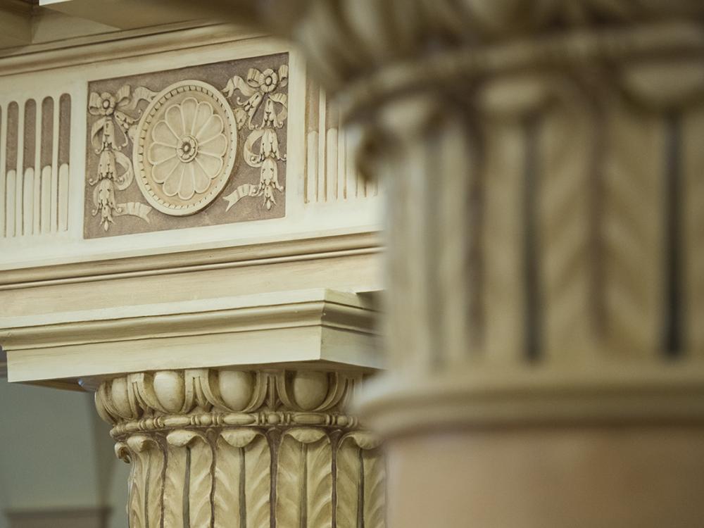closeup of white, engraved building column