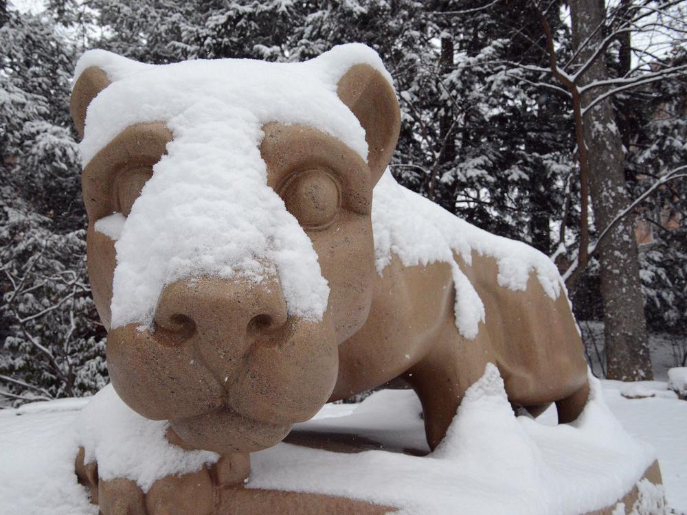 The Nittany Lion shrine covered in snow.