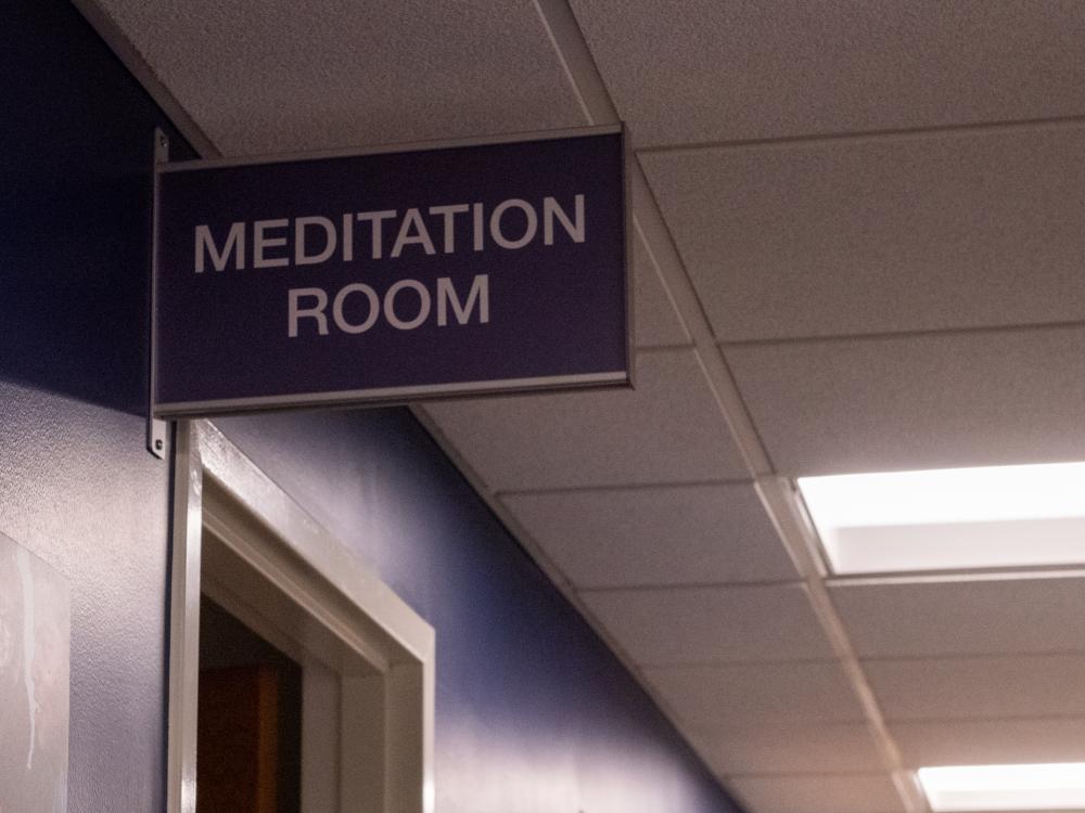 A sign in the Student Success Center indicates where students can find the new meditation space