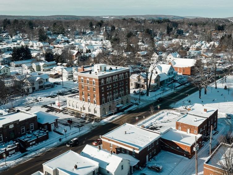 An aerial view of downtown Corry, including the Corry Higher Education Council building.