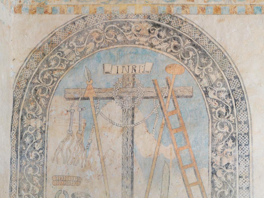 A mural of Christ's cross on a monastery wall in Yucatan