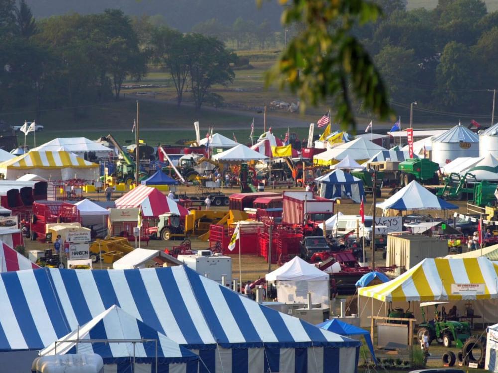 Tents and equipment in the exhibits field at Ag Progress Days