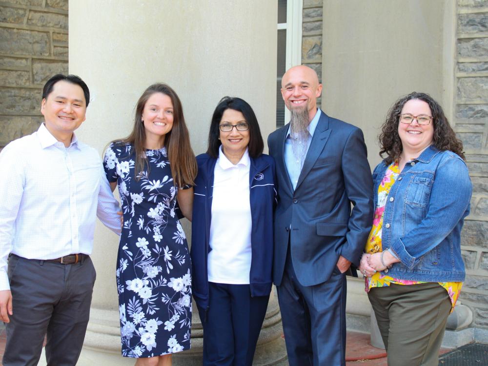 USAC staff award recipients with Neeli Bendapudi